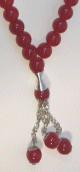 Chapelet (Subha) de luxe a 33 perles de couleur Rouge avec petites perles argentees