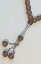 Chapelet (Subha) de luxe a 33 perles de couleur Marron clair avec parties argentees
